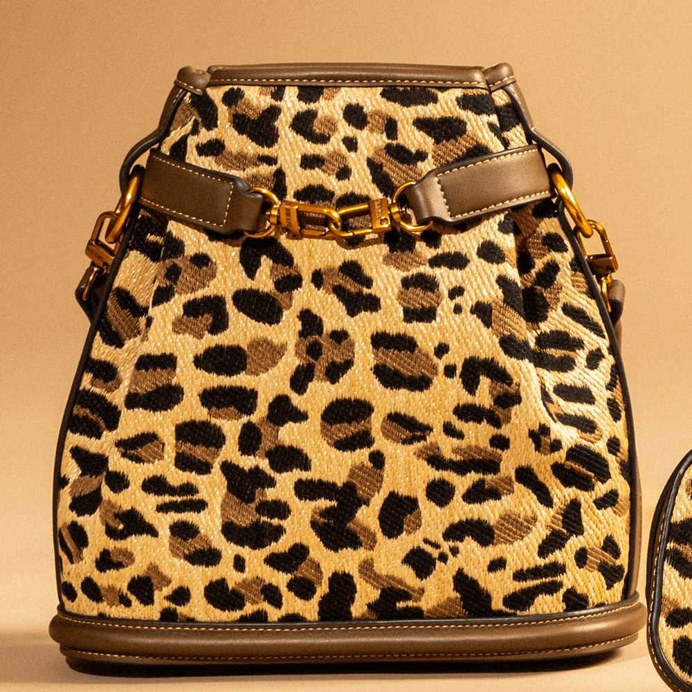 Bolsa Bucket Tramado Onça Animal Print Alça Corrente